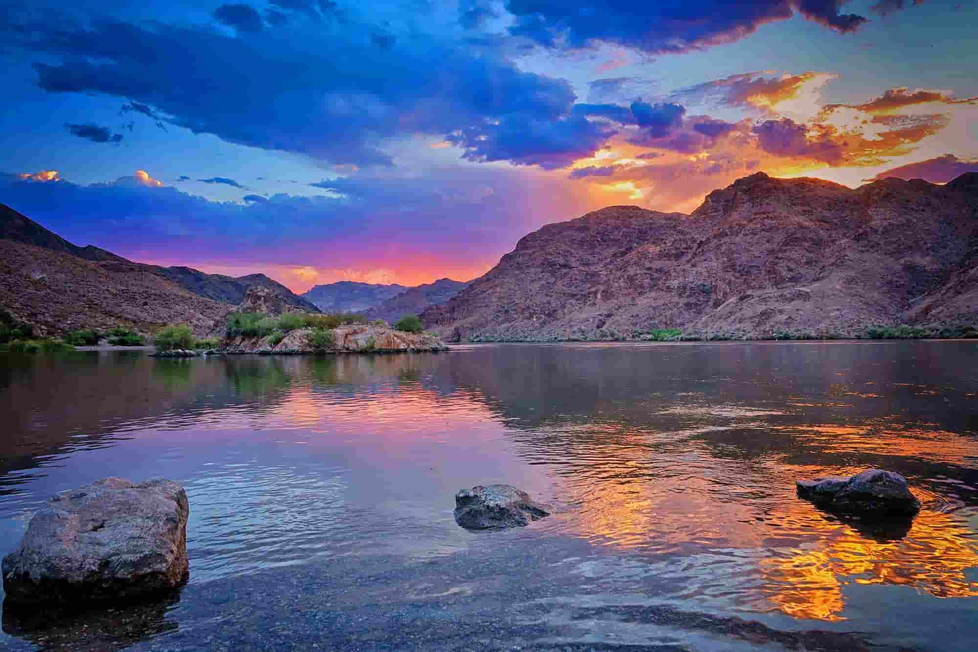 Sunset kayak tour Colorado River golden hour canyon walls Las Vegas Nevada
